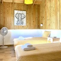 Chambre enfants 2 lits simples vue jardin